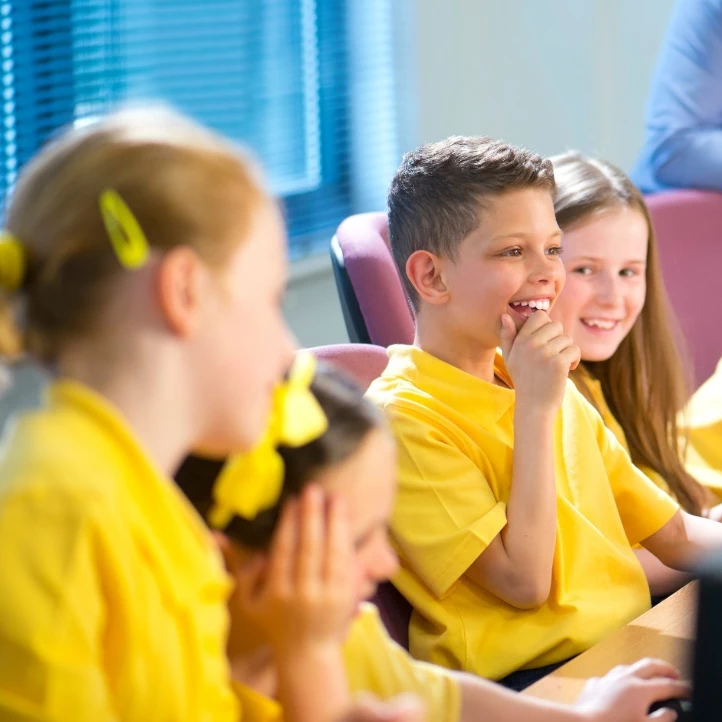 Class of primary school children during an IT lesson